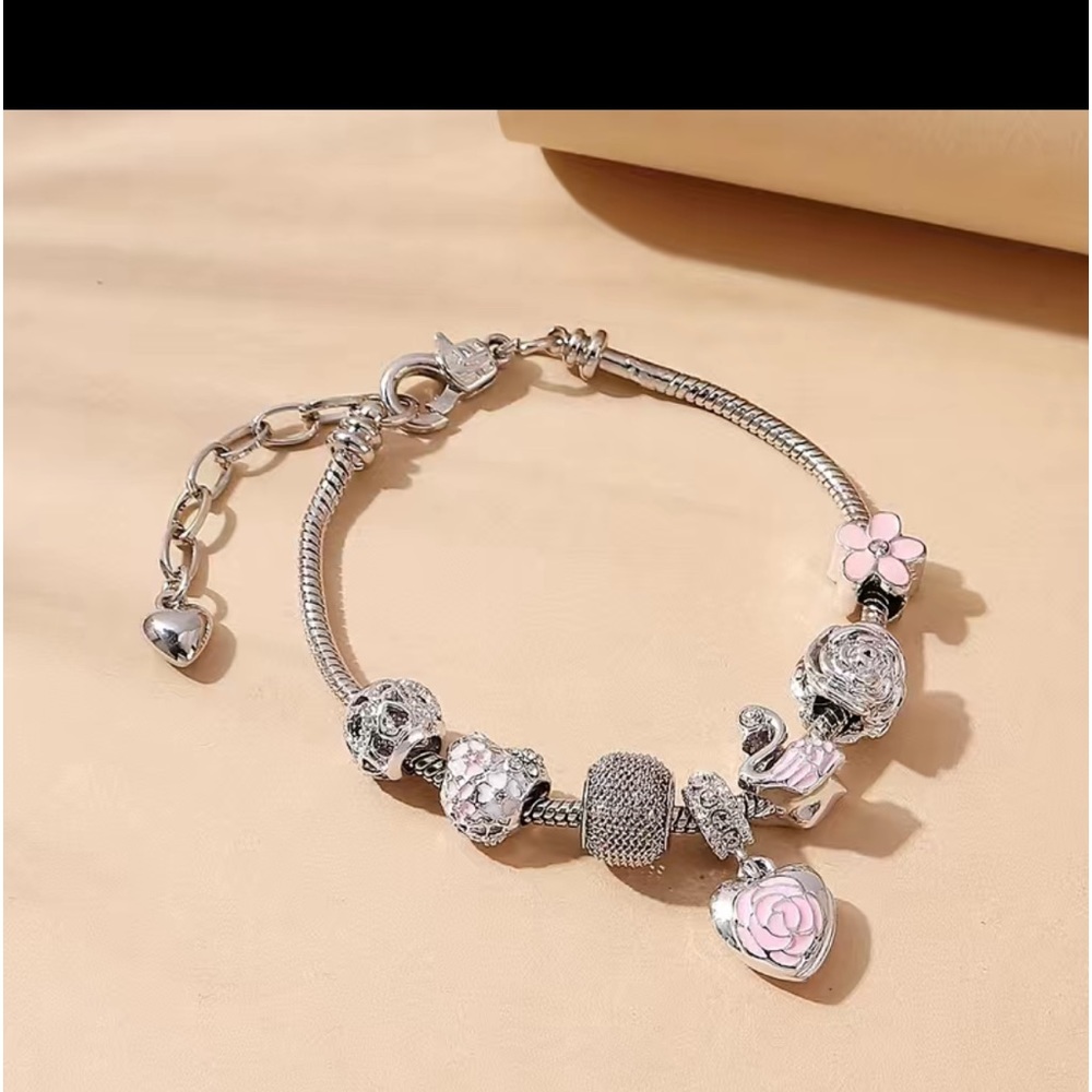 Silvery flower swan charm bracelet - Picture 1 of 1